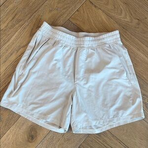 Lululemon Light Beige 5” pace breaker no liner.  Mens size small